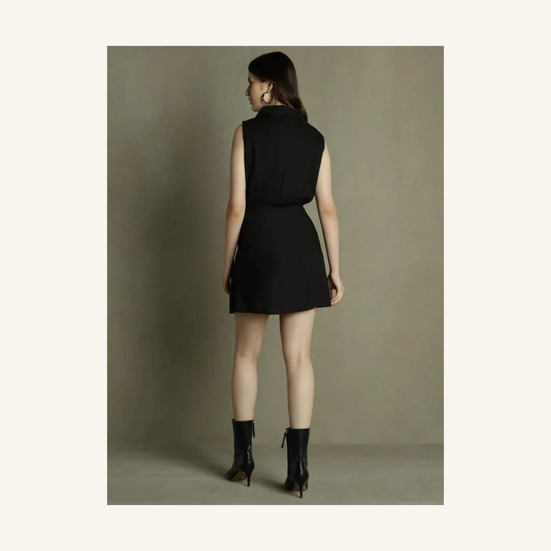 black sleeveless mini shirt dress with collared neck and tie waist
