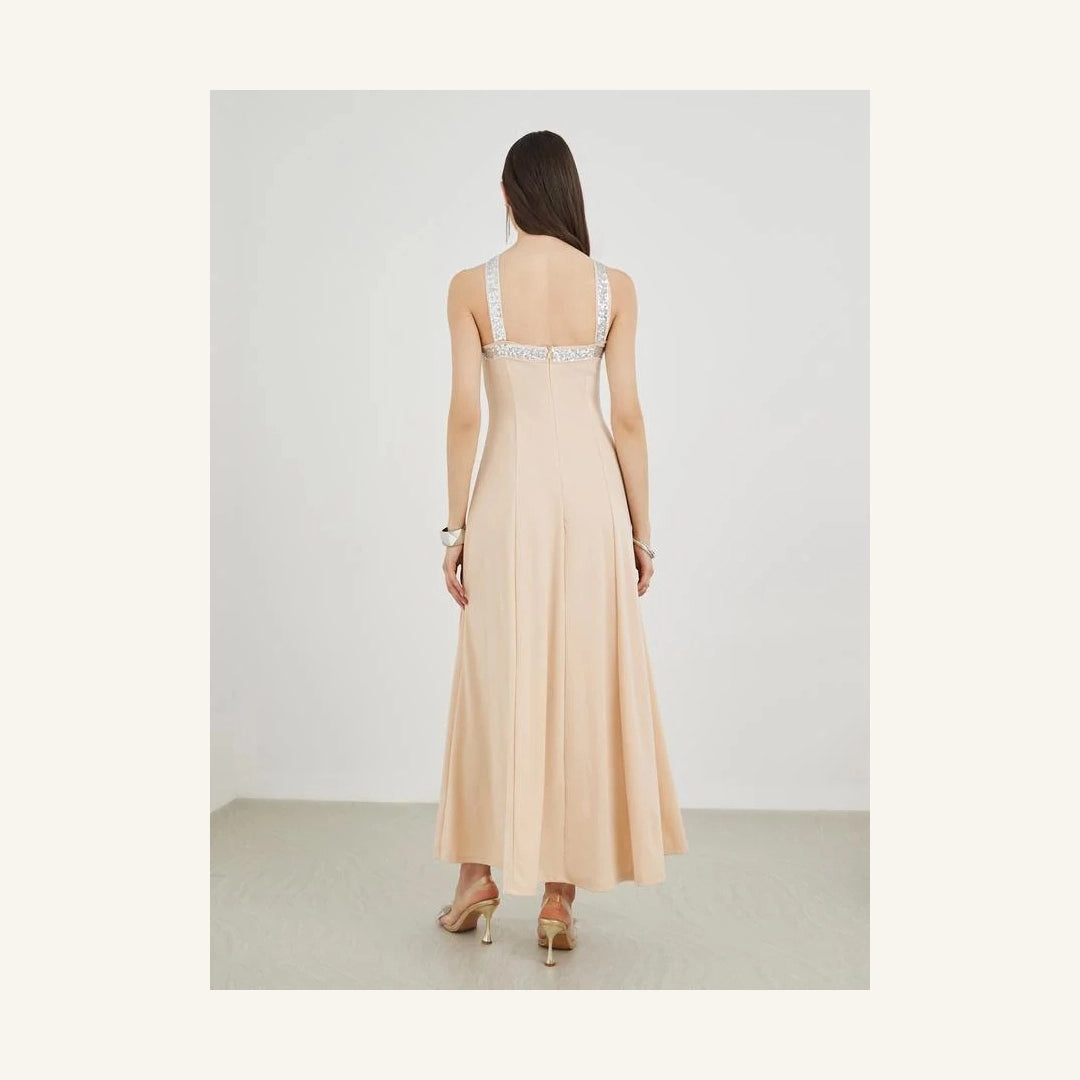 pale peach embellished sleeveless a-line maxi dress with halter neck