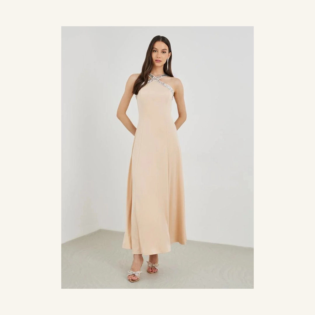 pale peach embellished sleeveless a-line maxi dress with halter neck