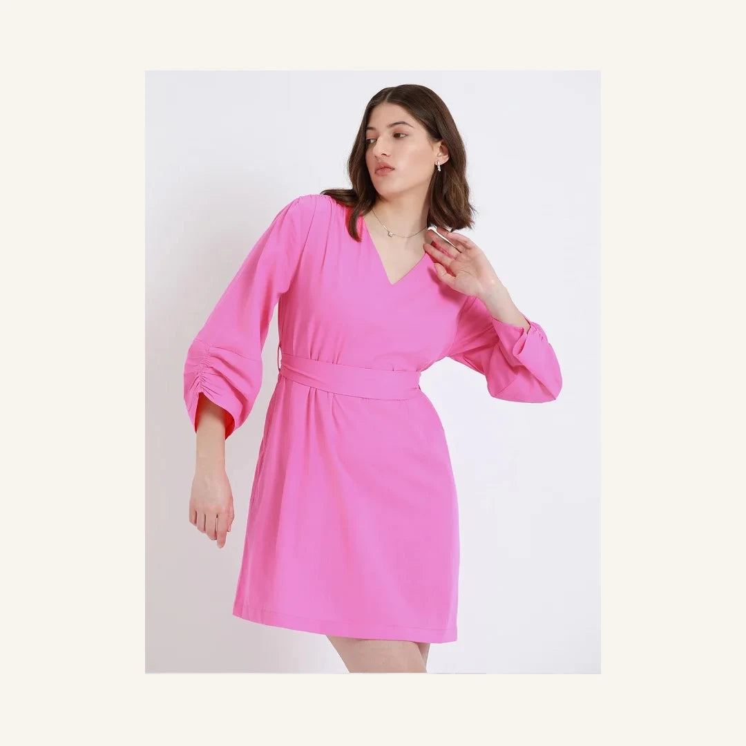 hot pink ruched sleeve mini dress with v-neck and cinched waist