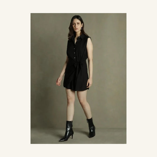black sleeveless mini shirt dress with collared neck and tie waist