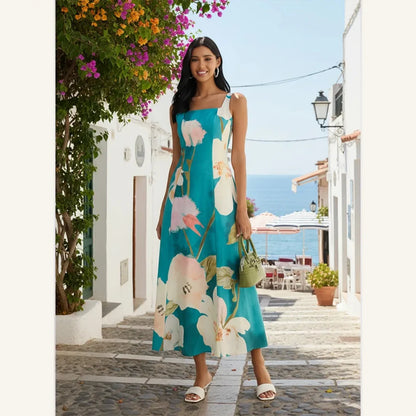 teal floral sleeveless midi dress with square neck and fit and flare style